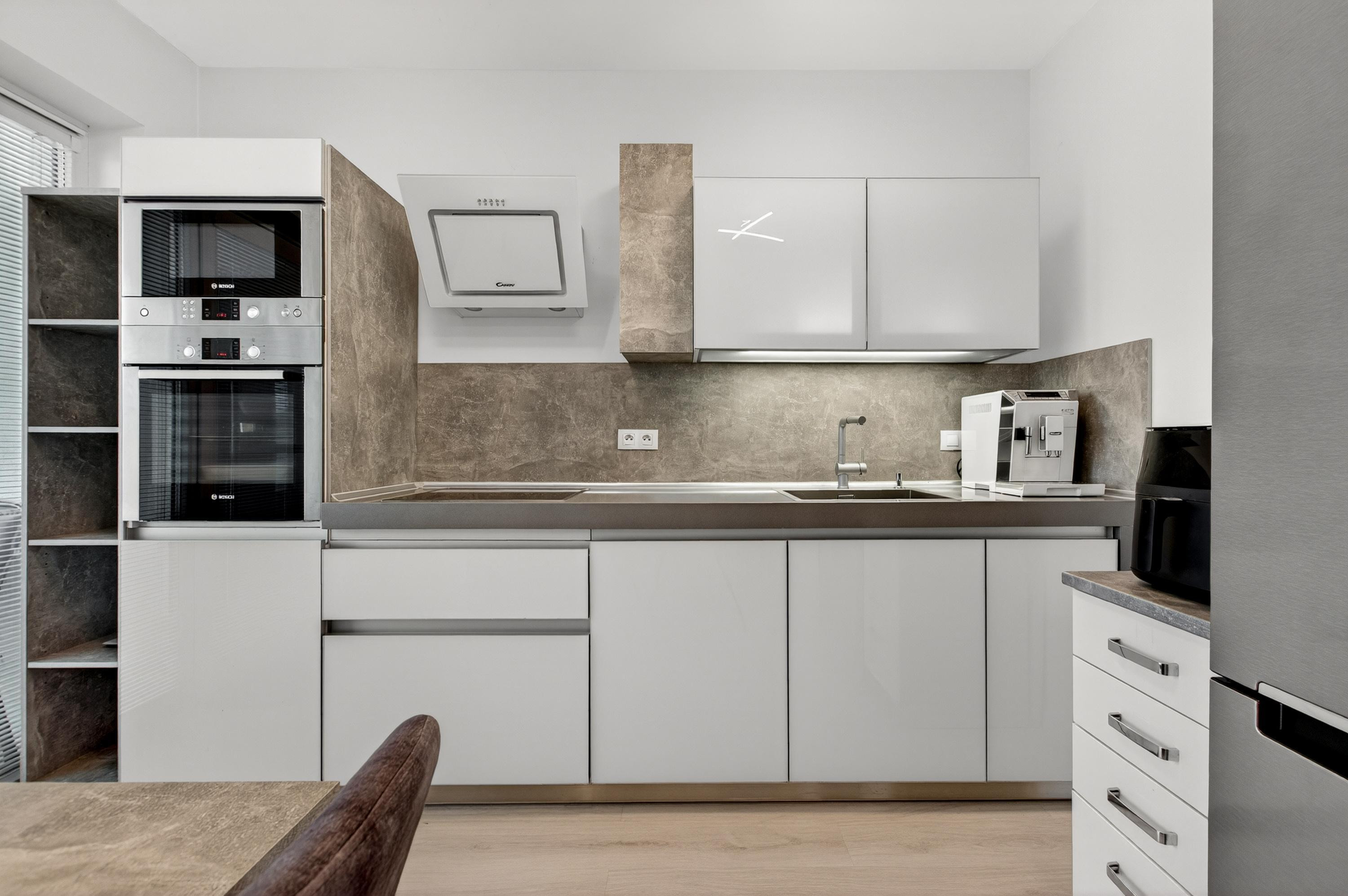 Na predaj 2-izbový byt so záhradkou a vlastným parkovacím miestom