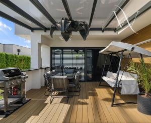 Senec (časť Malý Biel) - na predaj nadštandardný 4 izbový RD v tichej lokalite, s otvorenou galériou