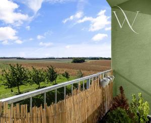 Na predaj slnečný 2-izbový byt s vlastným parkovacím miestom v obci Šelpice