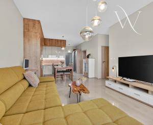 Na predaj 3-izbový byt so záhradkou a vlastným parkovacím miestom