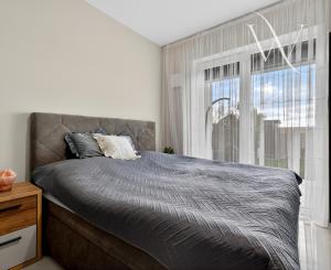 Na predaj 3-izbový byt so záhradkou a vlastným parkovacím miestom