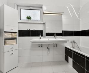 Na predaj 2-izbový byt so záhradkou a vlastným parkovacím miestom