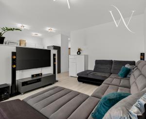 Na predaj 2-izbový byt so záhradkou a vlastným parkovacím miestom