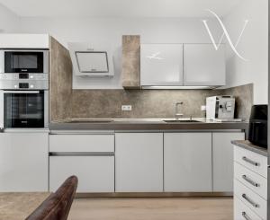 Na predaj 2-izbový byt so záhradkou a vlastným parkovacím miestom