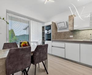 Na predaj 2-izbový byt so záhradkou a vlastným parkovacím miestom