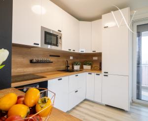 Na PREDAJ moderný 3-izbový byt s balkónom (87,56 m2) a dvoma garážovými státiami v novostavbe TAMMI, Bratislava Dúbravka