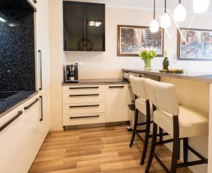 Na predaj  moderný 2 izbový byt v Bratislave v proekte -Slniečnice s pivničnou kopkou a parkovacím statim