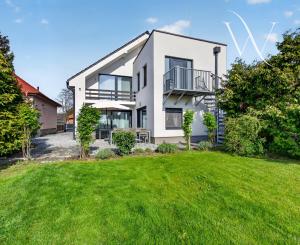 NA PREDAJ! 8 izbový dvojgeneračný poschodový rodinný dom v Tomášove