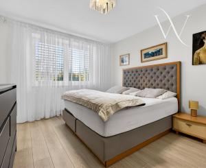 NA PREDAJ! 8 izbový dvojgeneračný poschodový rodinný dom v Tomášove