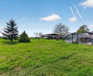 NA PREDAJ! 8 izbový dvojgeneračný poschodový rodinný dom v Tomášove