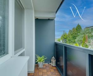 HRUBÁ BORŠA, OKR. SENEC - NA PREDAJ 4 izbový byt s vlastným kúrením a garážou.