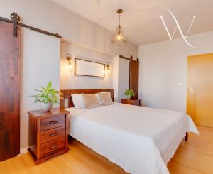 SENEC – NA PREDAJ EXKLUZÍVNY 3 + 1 PODKROVNÝ  BYT  – JEDINEČNÝ PRIESTOR NA PEŠEJ ZÓNE.