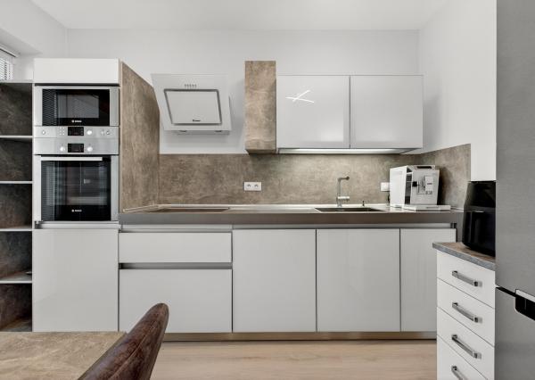 Na predaj 2-izbový byt so záhradkou a vlastným parkovacím miestom